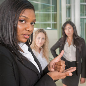 African-American woman signing ASL